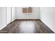 Neutral bedroom features updated flooring, bright light and minimal fixtures at 5918 S Parkside Dr, Tempe, AZ 85283