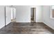 Clean bedroom with wood-look flooring and white paint at 5918 S Parkside Dr, Tempe, AZ 85283