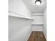 Walk-in closet featuring multiple shelves for optimal storage and organization at 5918 S Parkside Dr, Tempe, AZ 85283