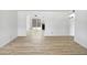 Open living space with neutral walls, light wood flooring and sliding glass doors at 5918 S Parkside Dr, Tempe, AZ 85283