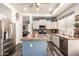 Well-equipped kitchen with island and stainless steel appliances at 5993 W Topeka Dr, Glendale, AZ 85308