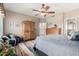 Inviting main bedroom featuring wood furniture and relaxing decor at 5993 W Topeka Dr, Glendale, AZ 85308