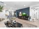 Living room with open access to kitchen and a stairway to the upper level at 6338 W Raymond St, Phoenix, AZ 85043