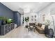 Cozy living room with a comfortable sectional sofa and stylish decor at 6338 W Raymond St, Phoenix, AZ 85043