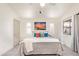 Bright bedroom with art, neutral colors, and a relaxing feel at 64 N 63Rd St # 55, Mesa, AZ 85205