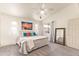 Well-lit bedroom with neutral colors and large window with a view at 64 N 63Rd St # 55, Mesa, AZ 85205