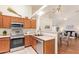 Well-equipped kitchen features stainless steel appliances and lots of storage at 64 N 63Rd St # 55, Mesa, AZ 85205