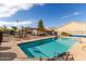Community pool area, perfect for relaxing and enjoying sunny days at 64 N 63Rd St # 55, Mesa, AZ 85205