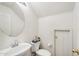Powder room with pedestal sink and toilet at 7501 S 14Th St, Phoenix, AZ 85042