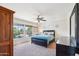 Bedroom featuring carpet, neutral walls, and natural light through windows at 7501 S 14Th St, Phoenix, AZ 85042