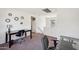 View of the loft featuring neutral walls and carpet with natural light at 7501 S 14Th St, Phoenix, AZ 85042