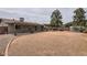 Back exterior showcasing the covered patio and large, low maintenance backyard at 828 E Le Marche Ave, Phoenix, AZ 85022