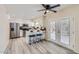 Stylish kitchen with stainless steel appliances, white cabinets, and an island with seating at 828 E Le Marche Ave, Phoenix, AZ 85022
