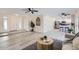 Spacious living area with modern flooring, open to the kitchen, ideal for entertaining guests at 828 E Le Marche Ave, Phoenix, AZ 85022