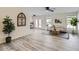 Bright living room with modern flooring, neutral decor, and plenty of natural light at 828 E Le Marche Ave, Phoenix, AZ 85022