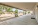 Expansive covered patio offering an ideal outdoor living space, overlooking the large backyard at 828 E Le Marche Ave, Phoenix, AZ 85022