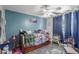 Bedroom with toys, a bed, and plenty of natural light at 8464 N 7Th Ave, Phoenix, AZ 85021