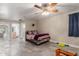 Open bedroom plan with tile flooring and convenient access to en-suite bathroom at 8464 N 7Th Ave, Phoenix, AZ 85021