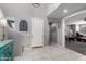 Bright foyer features tile floors, neutral paint, and staircase to the upper level at 868 W Desert Glen Dr, San Tan Valley, AZ 85143