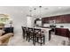 Spacious kitchen features an island with barstool seating and stainless steel appliances at 868 W Desert Glen Dr, San Tan Valley, AZ 85143
