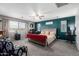 Comfortable main bedroom with plush carpet, accent wall, and modern decor at 868 W Desert Glen Dr, San Tan Valley, AZ 85143