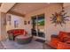 Covered patio featuring comfortable seating is perfect for outdoor entertaining and relaxation at 868 W Desert Glen Dr, San Tan Valley, AZ 85143