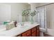 This bathroom features a vanity, faucet and is tastefully decorated at 871 E Melanie St, San Tan Valley, AZ 85140