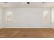Bright bedroom featuring neutral walls, carpet flooring, and natural light at 871 E Melanie St, San Tan Valley, AZ 85140