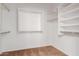 Walk-in closet with custom shelving and ample space for organization and storage at 871 E Melanie St, San Tan Valley, AZ 85140