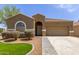 Charming home featuring desert landscaping, paver driveway, and a neutral color palette at 871 E Melanie St, San Tan Valley, AZ 85140