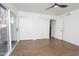Bright bedroom with sliding glass door access and ample closet space at 925 E Wagoner Rd, Phoenix, AZ 85022