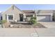 Charming single-story home with a tidy front yard and two-car garage at 925 E Wagoner Rd, Phoenix, AZ 85022