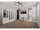 Bright bedroom offering a ceiling fan, closet, and TV hookups, perfect for relaxing or entertaining guests at 10071 W Angels Ln, Peoria, AZ 85383