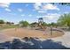 Community playground with a slide, bridge and climbing nets at 10071 W Angels Ln, Peoria, AZ 85383