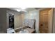 Functional bathroom with a sink, mirror, and a shower with glass doors at 10408 W Devonshire Ave, Phoenix, AZ 85037