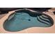 Private in-ground pool, perfect for relaxing and entertaining with tanning deck and ladder entry at 10408 W Devonshire Ave, Phoenix, AZ 85037