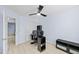 Comfortable bedroom featuring a ceiling fan, light blue walls, and modern decor at 11056 W Lane Ave, Glendale, AZ 85307