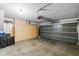 Well-lit garage with ample storage cabinets and epoxy flooring at 11056 W Lane Ave, Glendale, AZ 85307