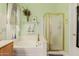Serene bathroom with a soaking tub, separate shower, and elegant fixtures at 115 E Spur Ave, Gilbert, AZ 85296