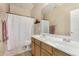 Well-lit bathroom with dual sinks, a shower/tub combo, and ample counter space at 12023 W Duane Ln, Peoria, AZ 85383