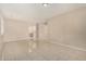 Spacious living room features tile flooring, neutral walls and ample natural light at 12023 W Duane Ln, Peoria, AZ 85383