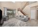 Open living room with modern decor, high ceilings, and a staircase at 12023 W Duane Ln, Peoria, AZ 85383