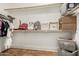 Large walk-in closet features ample shelving, hanging storage and wood flooring at 12023 W Duane Ln, Peoria, AZ 85383