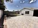 Charming backyard with brick pavers, green grass, providing a serene outdoor space at 1339 W Mesquite Ave, Apache Junction, AZ 85120
