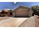 Charming single Gathering home with a two-car garage and low-maintenance landscaping at 1339 W Mesquite Ave, Apache Junction, AZ 85120