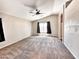 Large main bedroom with vaulted ceiling features neutral carpet and a ceiling fan at 1339 W Mesquite Ave, Apache Junction, AZ 85120