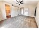 Large main bedroom featuring carpet, ceiling fan, and ensuite bathroom at 1339 W Mesquite Ave, Apache Junction, AZ 85120