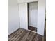 Bright bedroom with wood flooring and a large closet at 13801 N 37Th Dr, Phoenix, AZ 85053