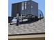The AC unit on the roof at 13801 N 37Th Dr, Phoenix, AZ 85053