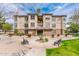 Inviting building exterior with desert landscaping and comfortable seating areas at 14950 W Mountain View Blvd # 5306, Surprise, AZ 85374